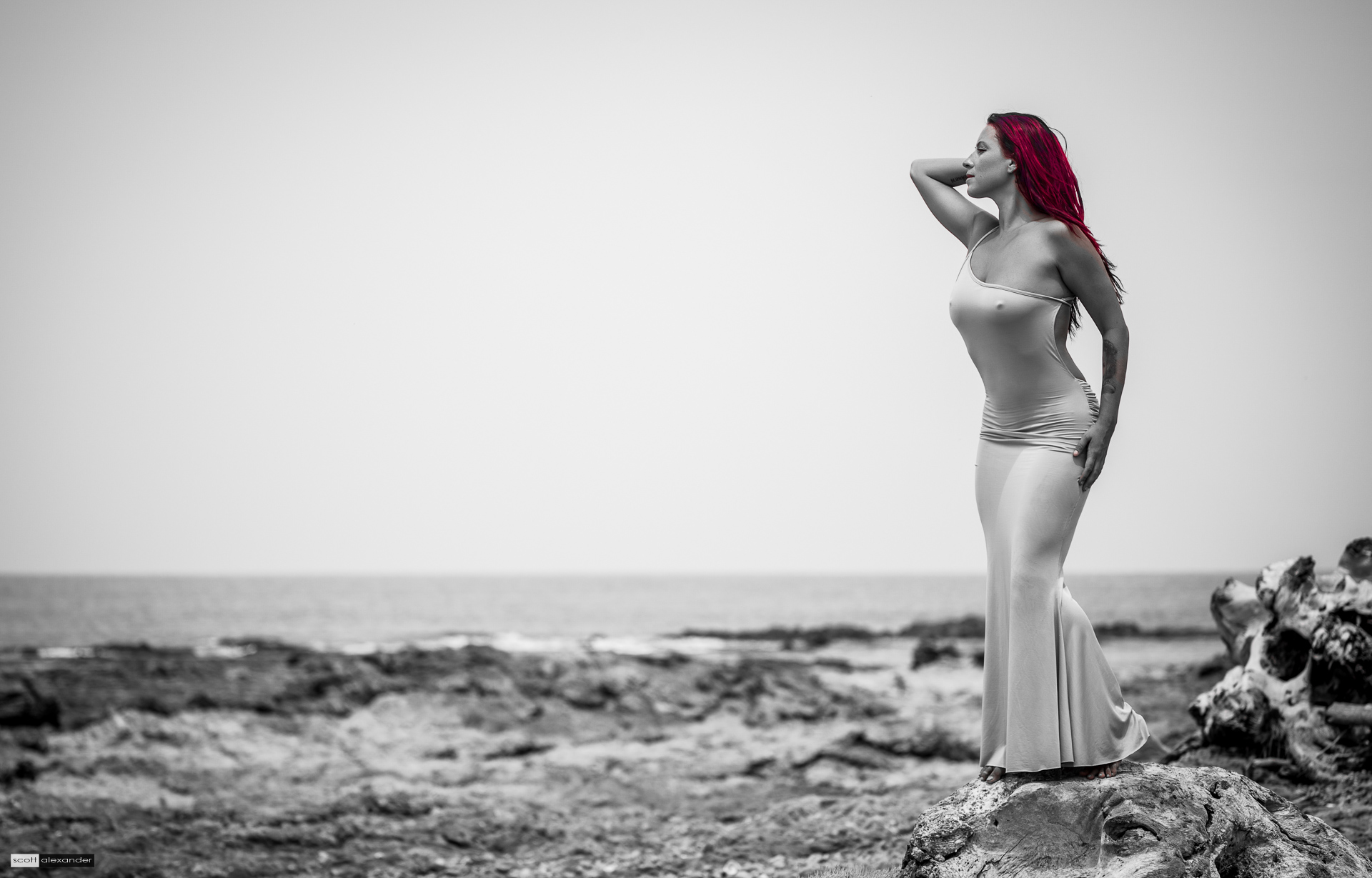 RoXXXie standing at the edge of the sea